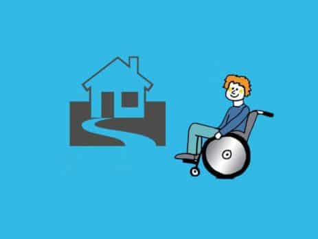 Grafik: Rollstuhlfahrer vor Haus